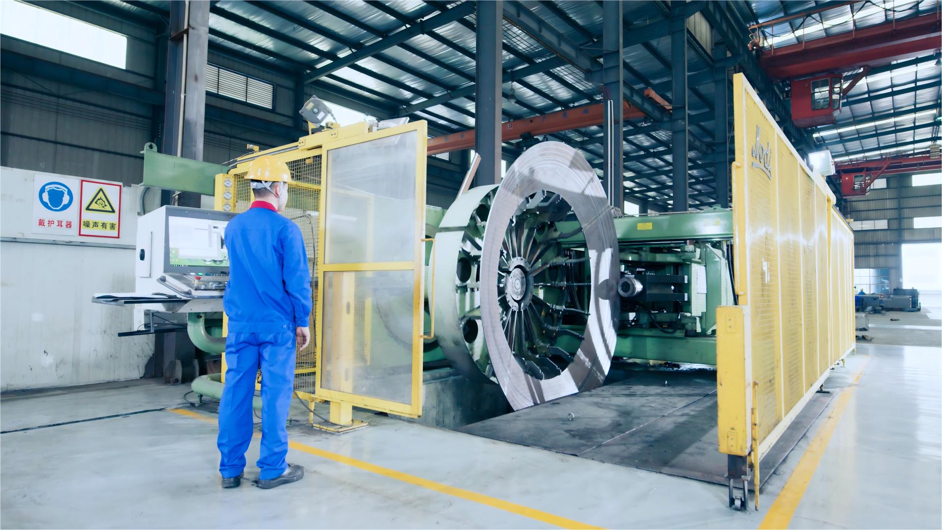 數(shù)控旋壓機(jī)